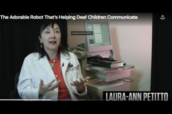 Laura Ann Petitto smiling on youtube explaining about How Deaf Children communicate